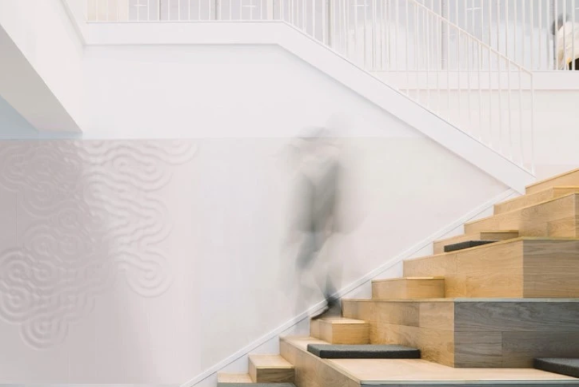 Wav concrete tile design wall blended into staircase space by Musca